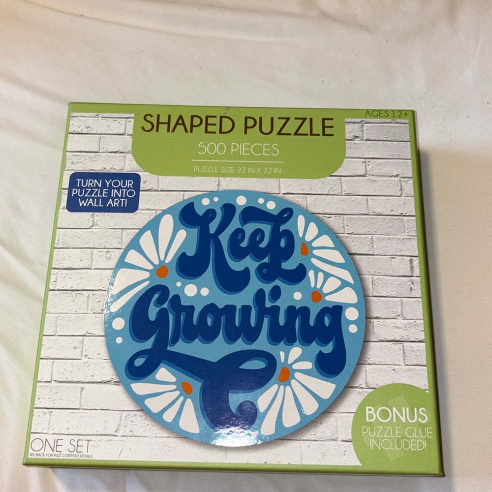 500 Pieces puzzle, brand new. Glue included